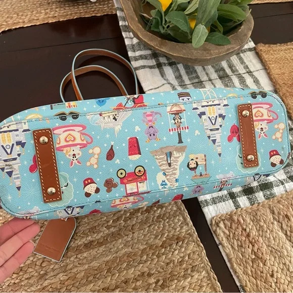Dooney and Bourke Disney “A walk in the park” tote by Jerrod Maruyama